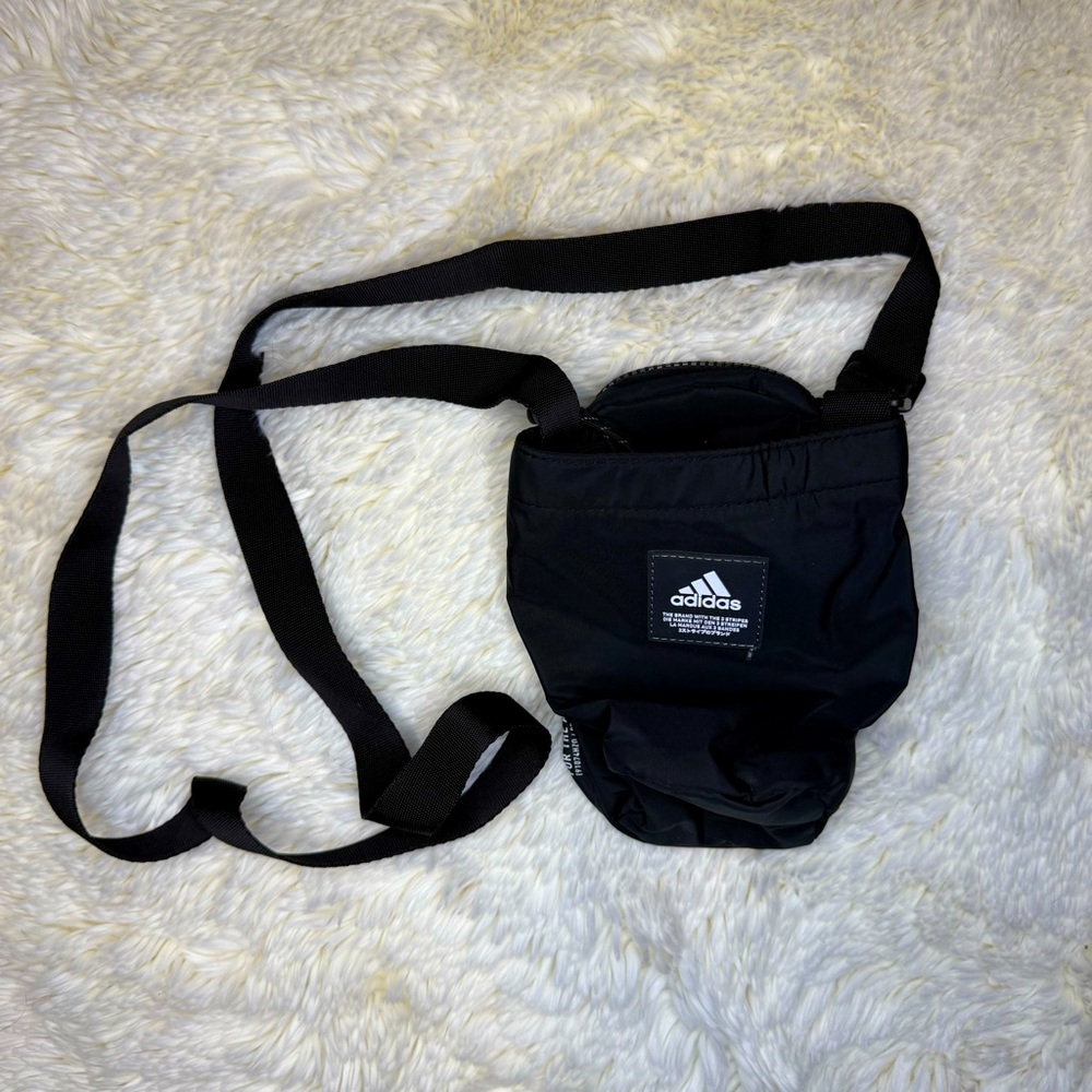 Adidas Black Crossbody Bag with phone, beverage, and multi storage compartments